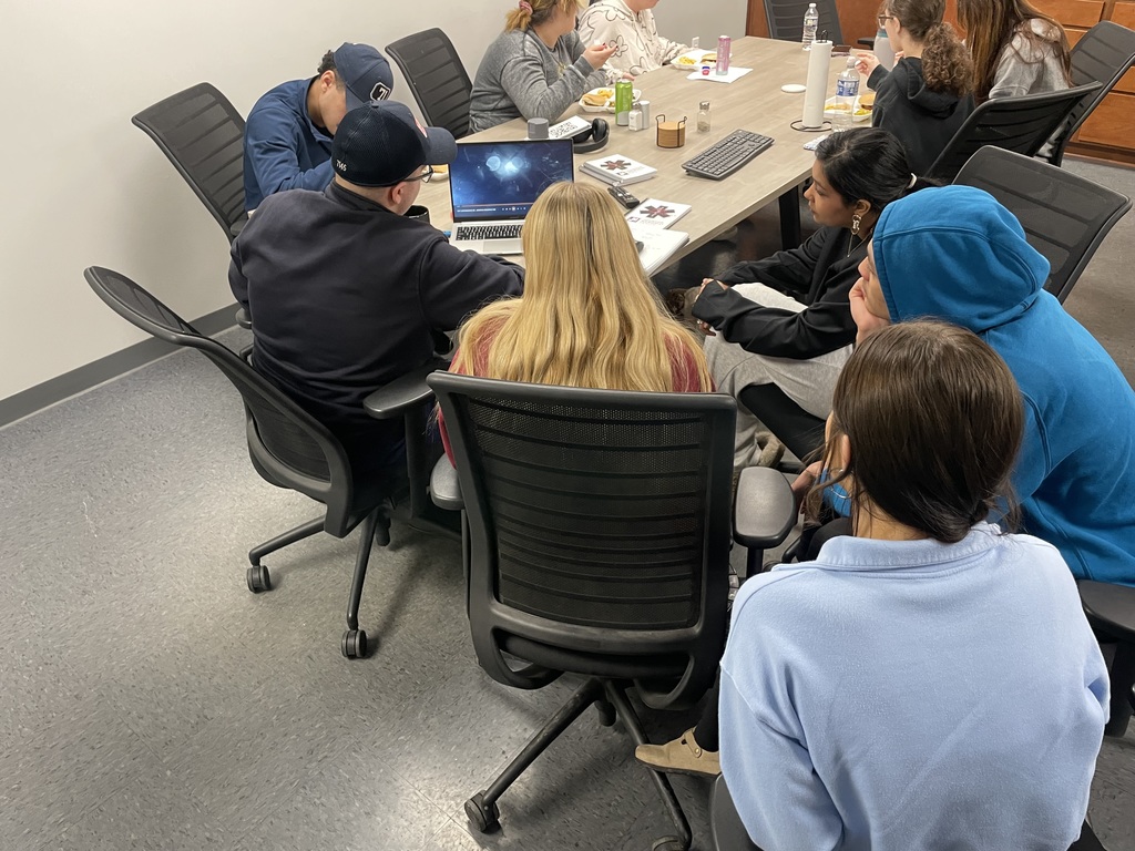 Students learning at firehouse