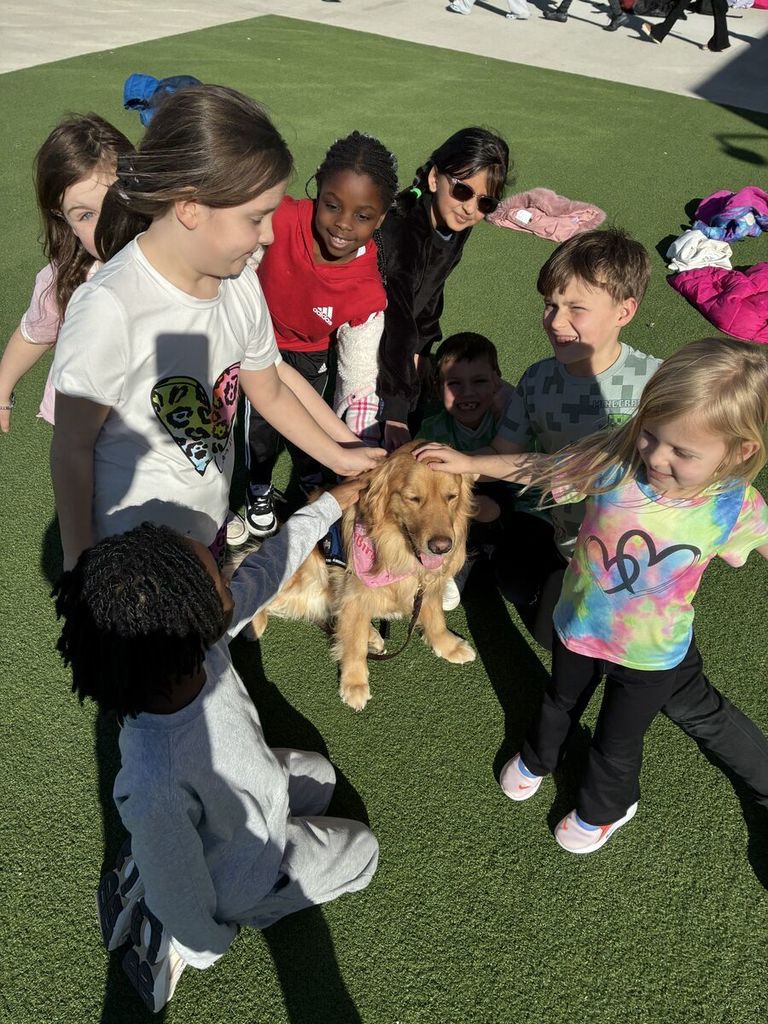 Daphane being petted by kids