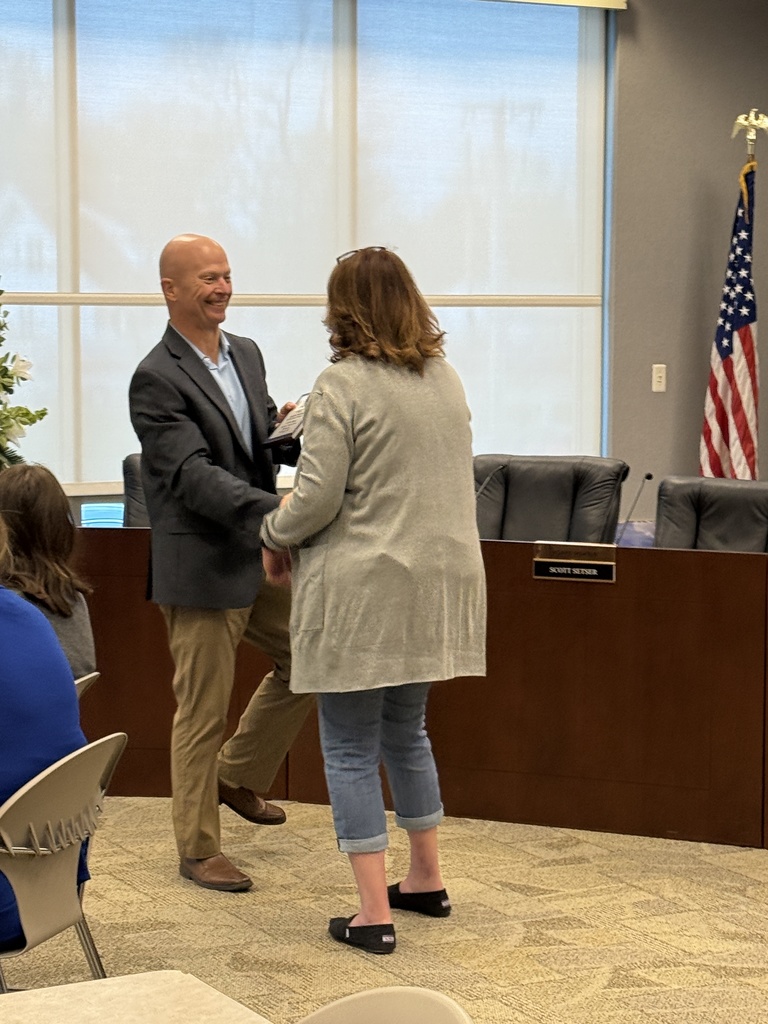 Dr. Edsell Congratulting Carrie