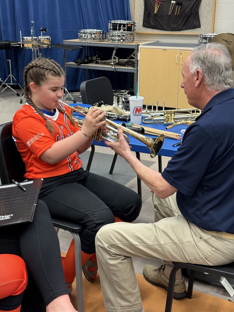 Student trying instrument