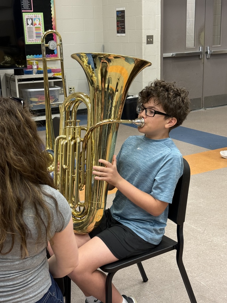 student playing instrament