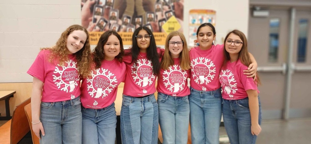 Girls in matching shirts 