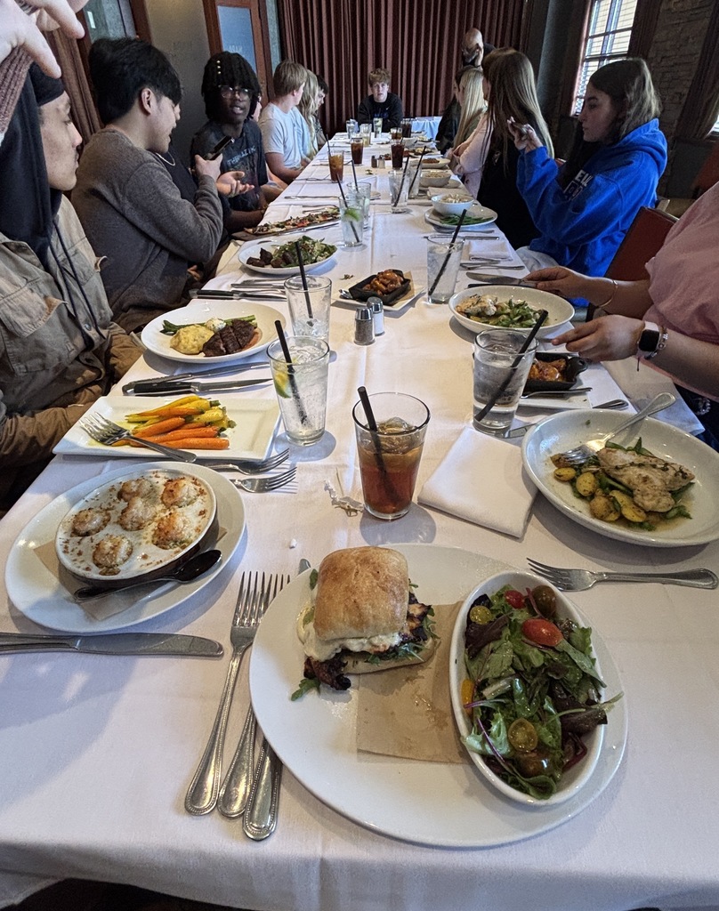 Students at the table with thier food