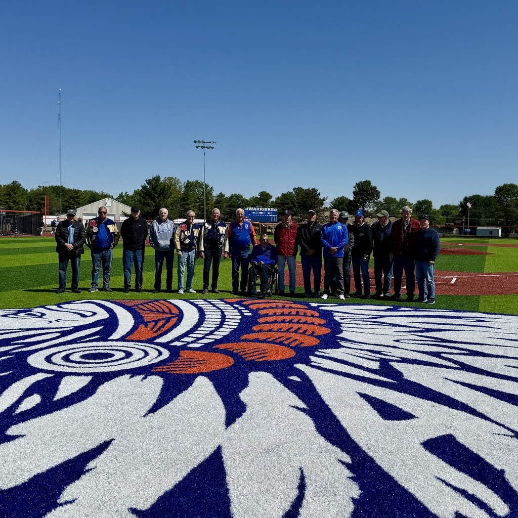 Alumni Baseball Players on the field
