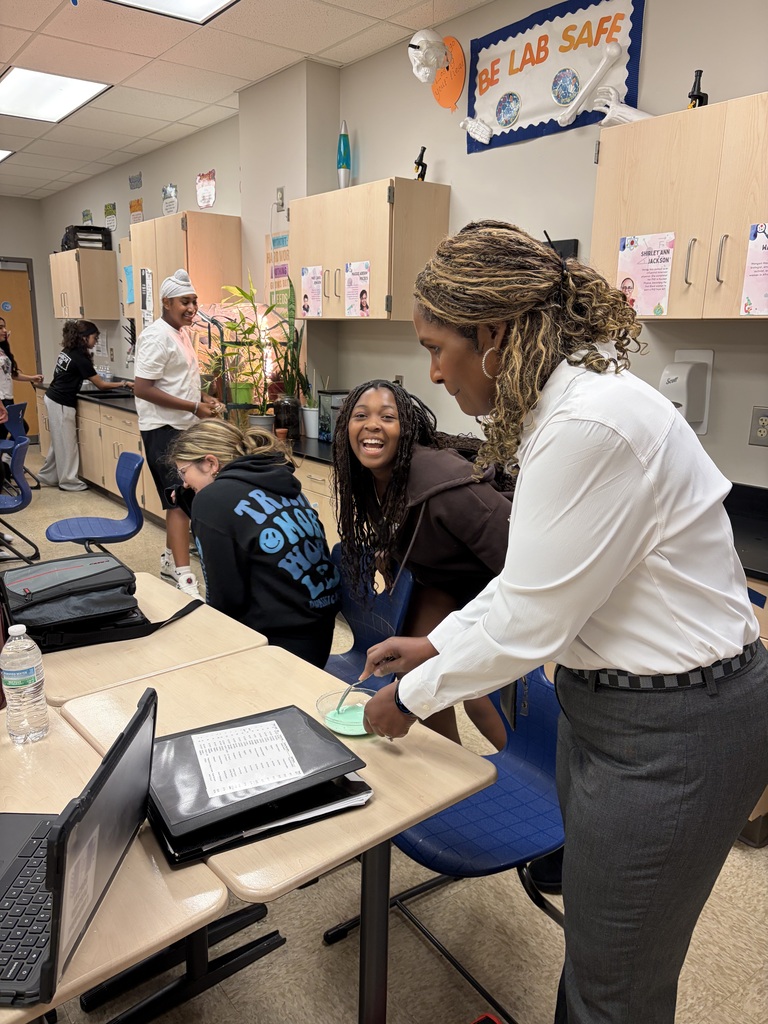 Dr Burris helping a student