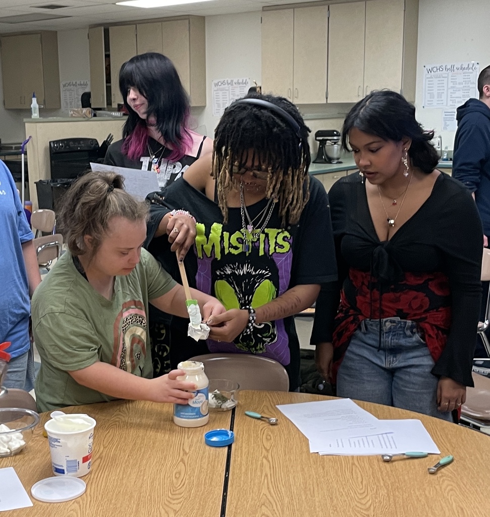 Girls putting ingredients together