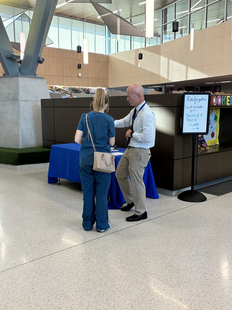 Dr. Edsell talking to a parent