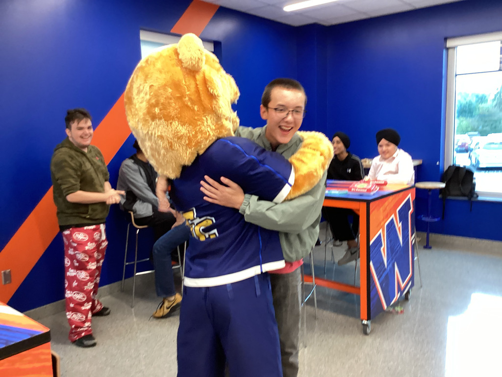 Griz hugging kid