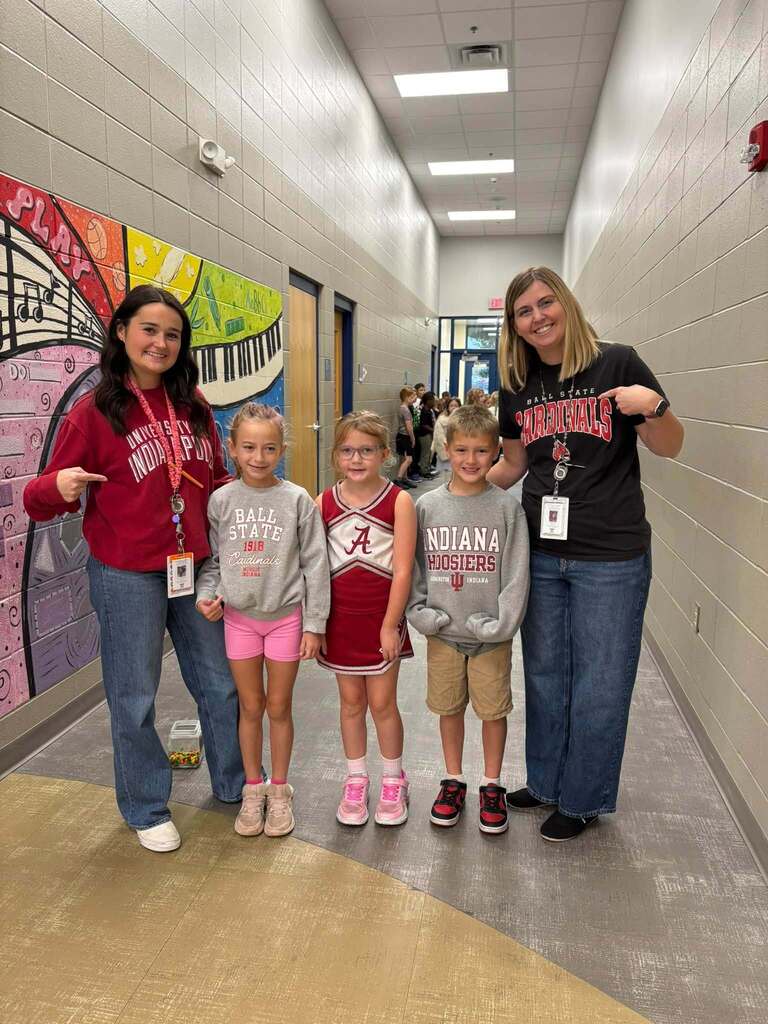 students and teachers in college clothes