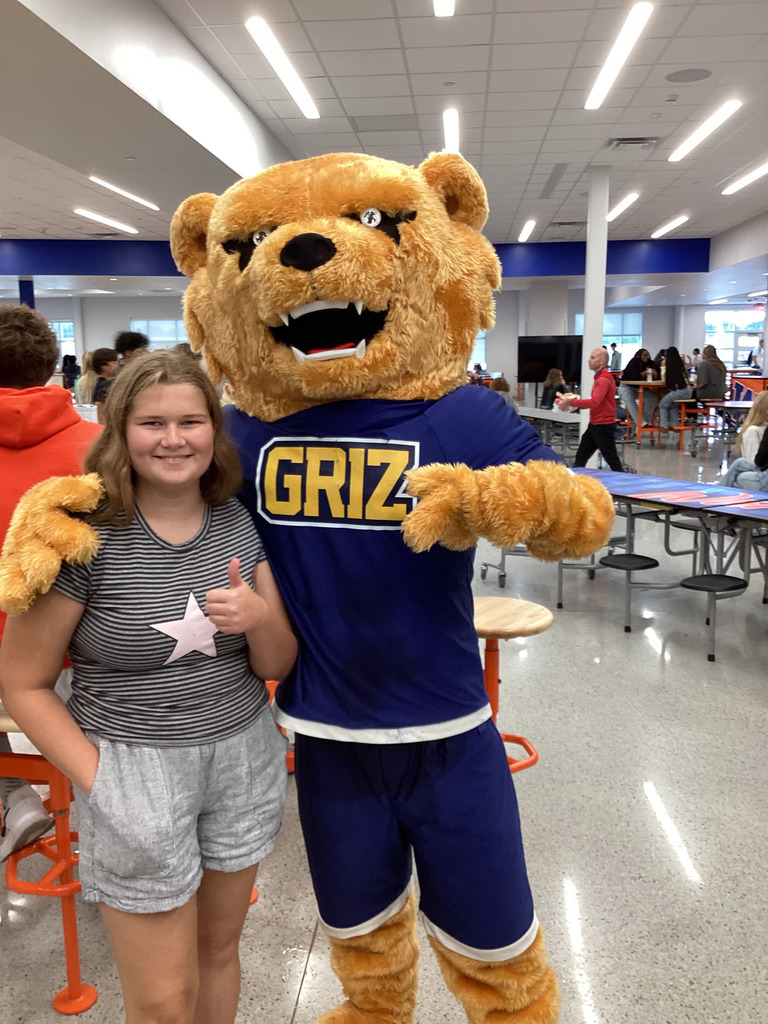 Student and griz