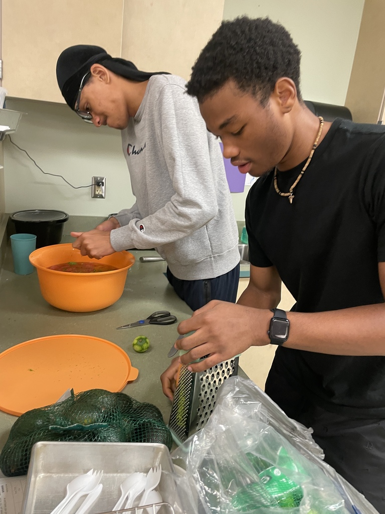 boys grating food