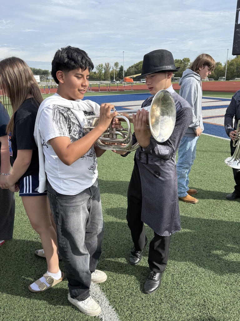 two students and an instrument