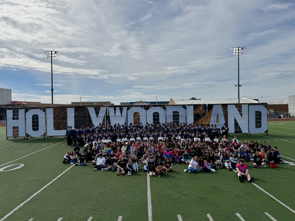 Hollywood land sign with all the kids