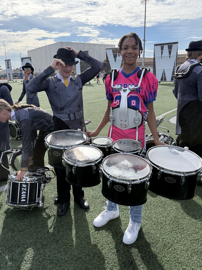 boy trying drums
