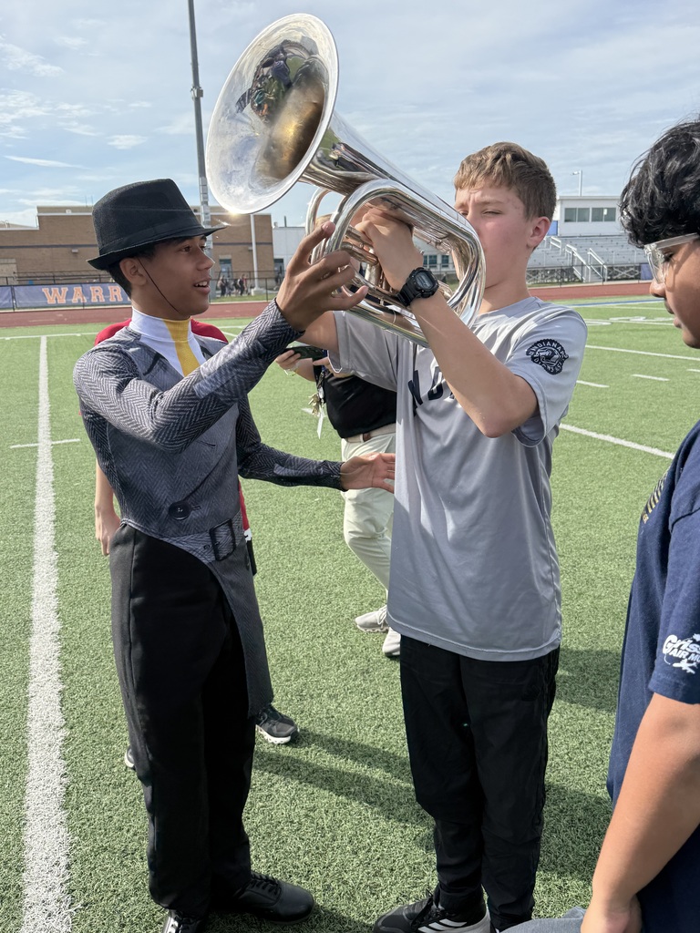 boy trying instrument