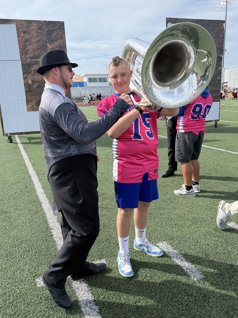 boy getting directions for instrument