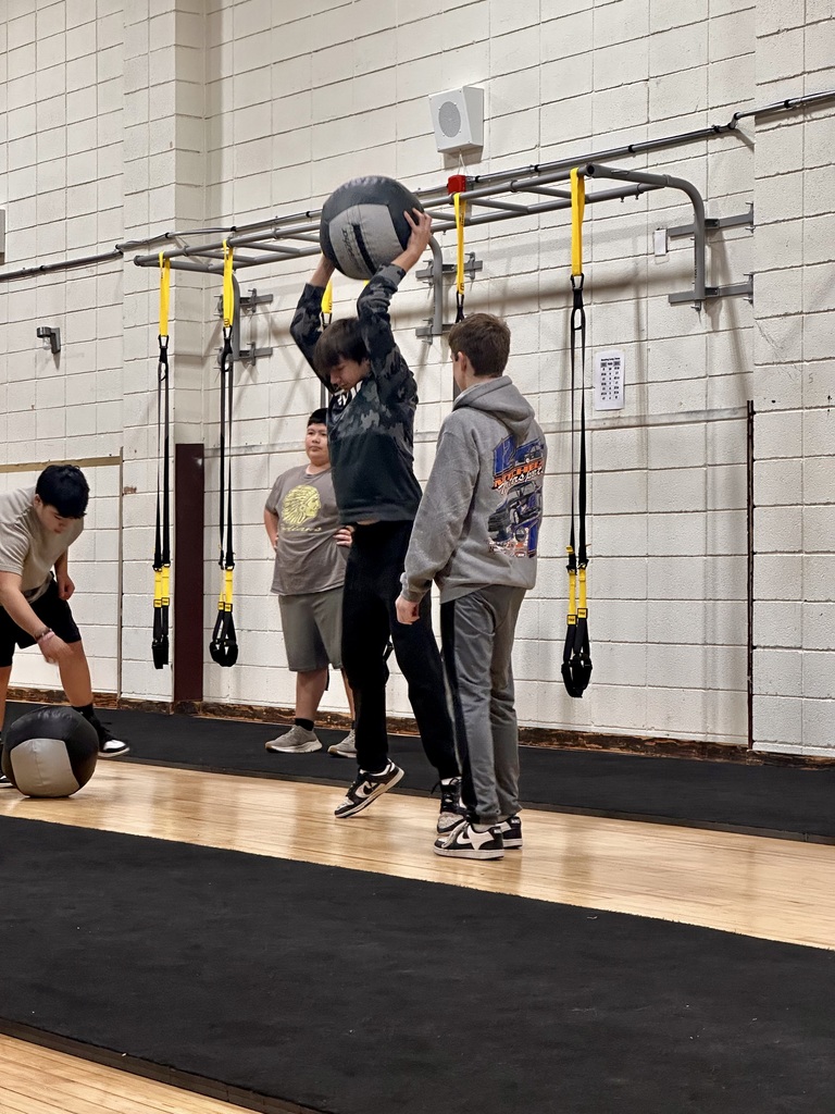 Students working in the gym on strength and conditioning