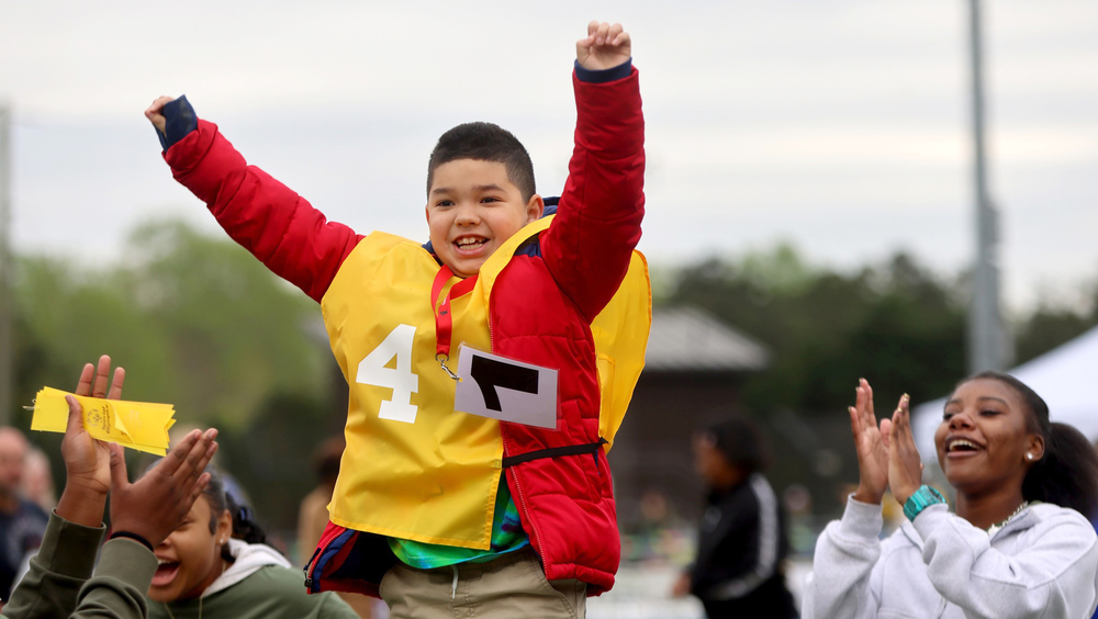 Student celebrating Special Olympics win