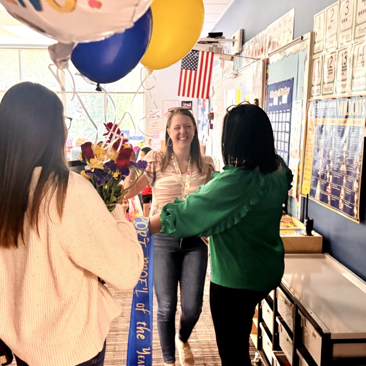 presenting Ms Garcia with her award