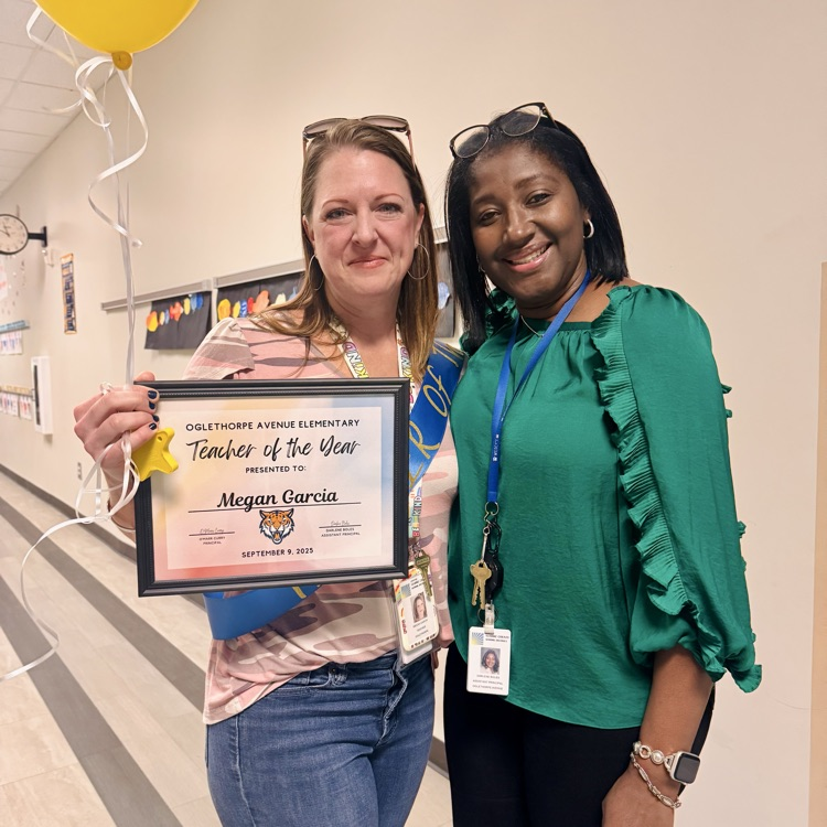 ms Garcia and Ms Boles pose with TOTY Award