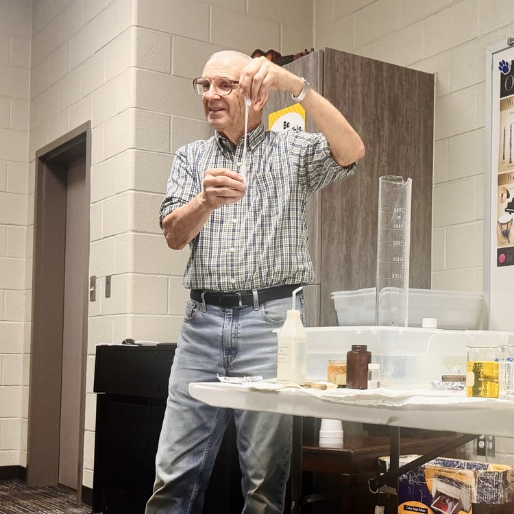 Dr. Snook turns a styrofoam cup into a stretchy goo