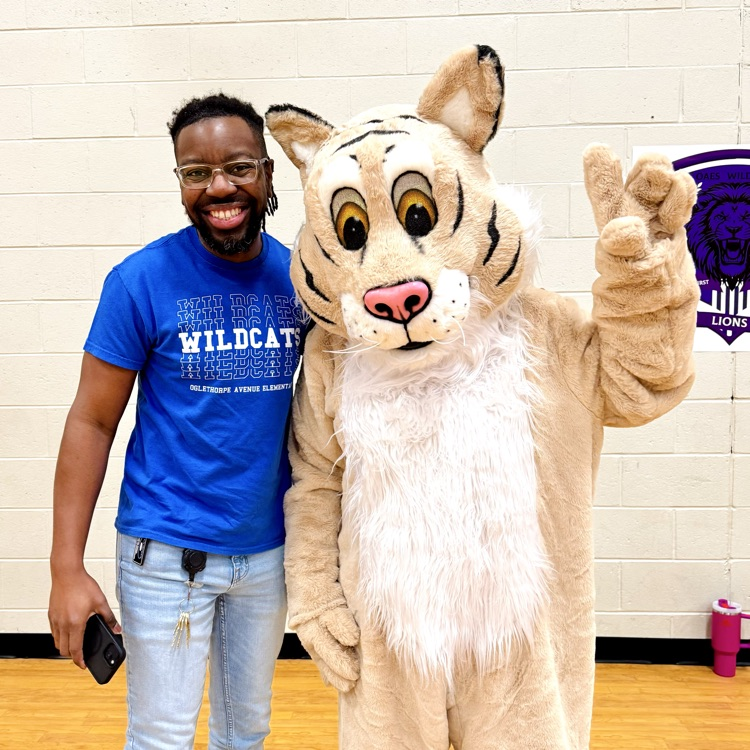principal curry with Pawsley the Wildcat