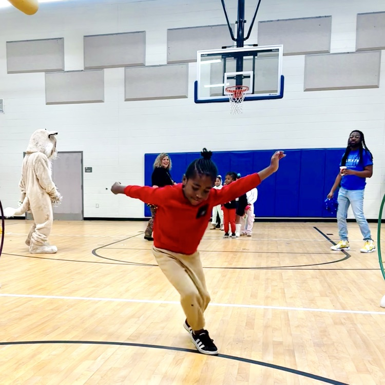 a boy dances to his den