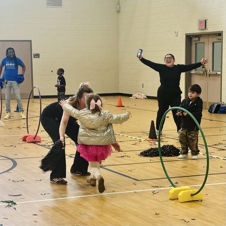 a teacher welcoming a student to her den