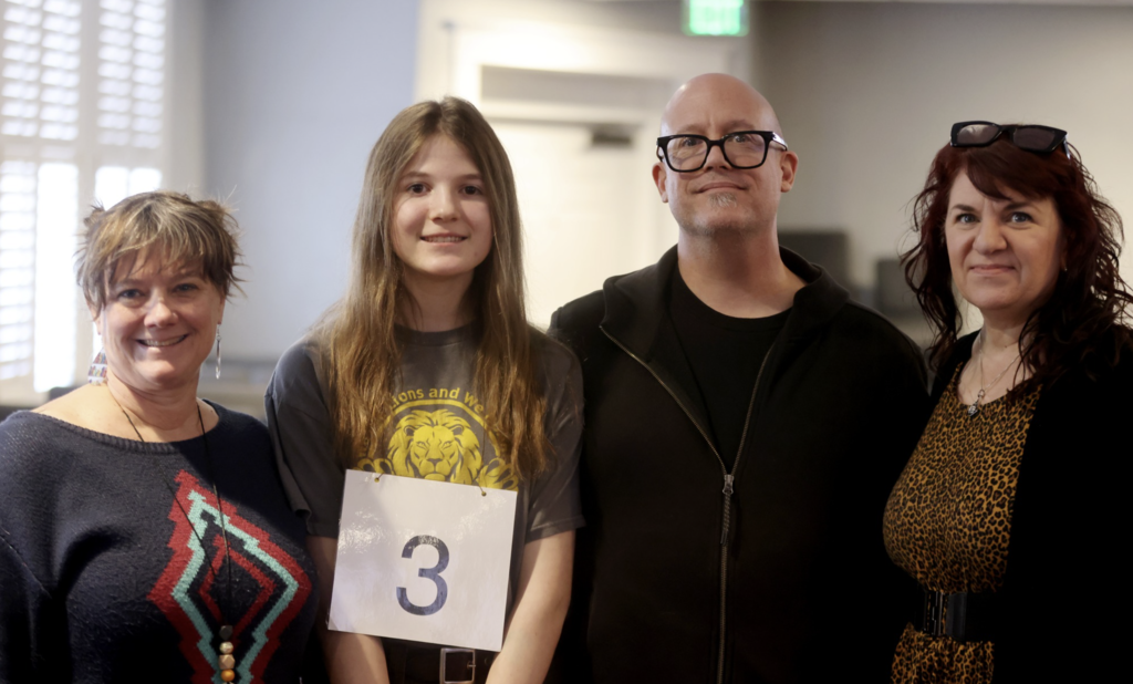 Pheobe Geisenhof wins District Spelling Bee.