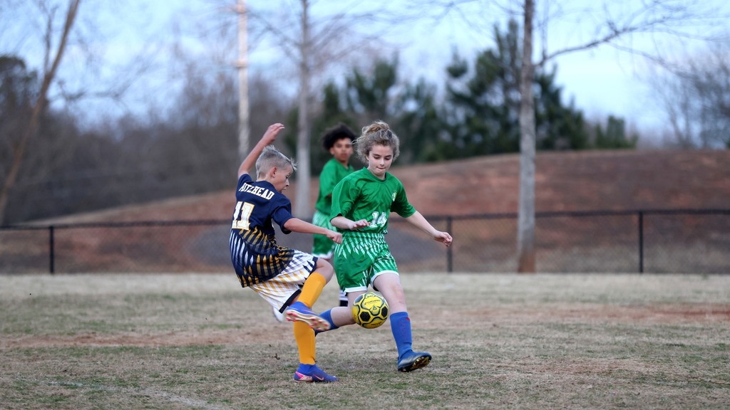 Boys playing soccer