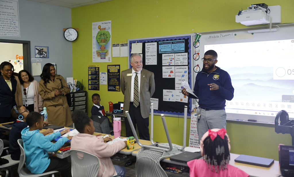 Pritchett teaching class