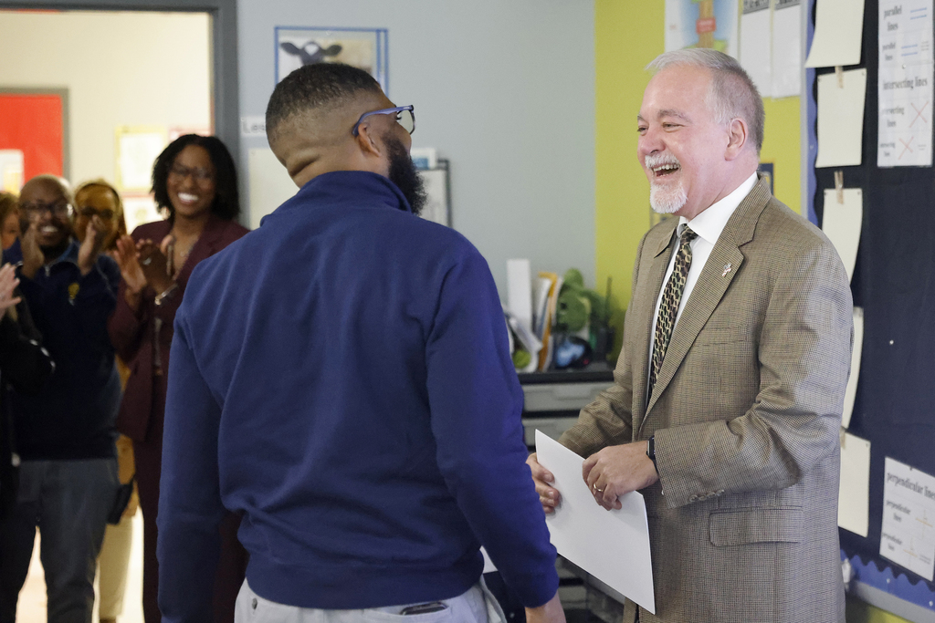 Pritchett celebrating with Woods