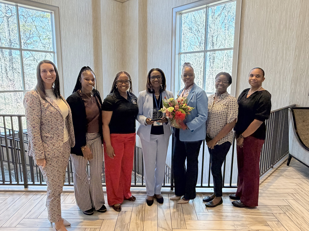 Photo of Angela Gay with other CCSD school social workers and district leaders