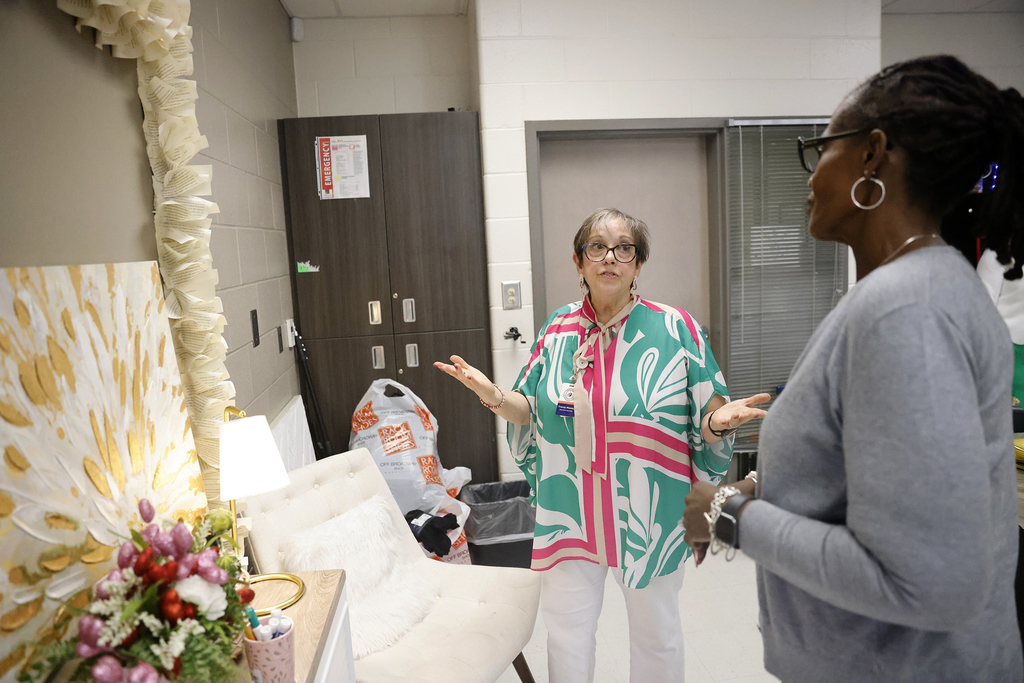 Tracey Massey and Annie Turman discussing food pantry location at BHL