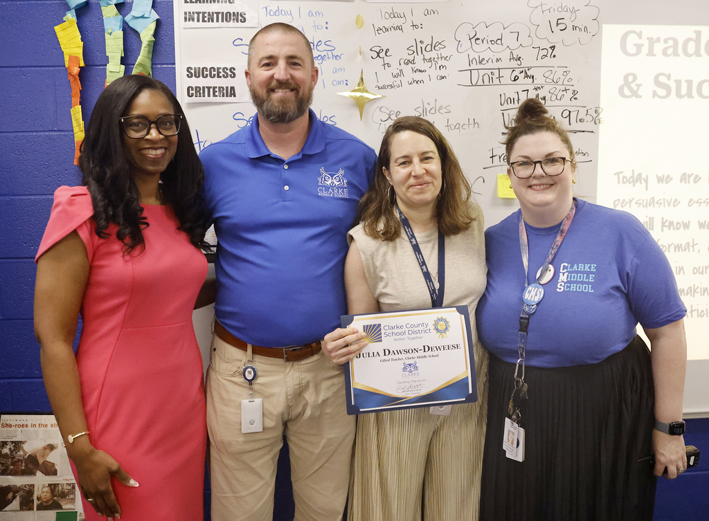 Julia Dawson-Deweese with Interim Superintendent Dr. Jennifer Scott, CMS Principal Derrick Maxwell, and CMS Assistant Principal Dr. Kristina Lerch-Batson