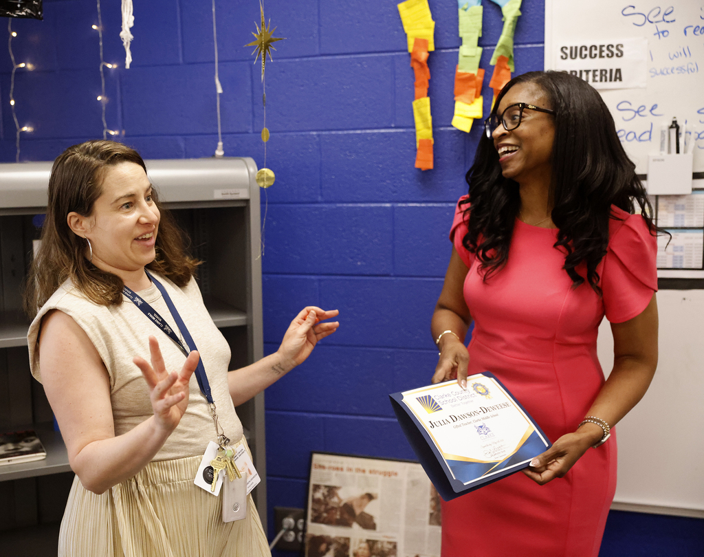 Julia Dawson-Deweese surprised with Employee of the Month award