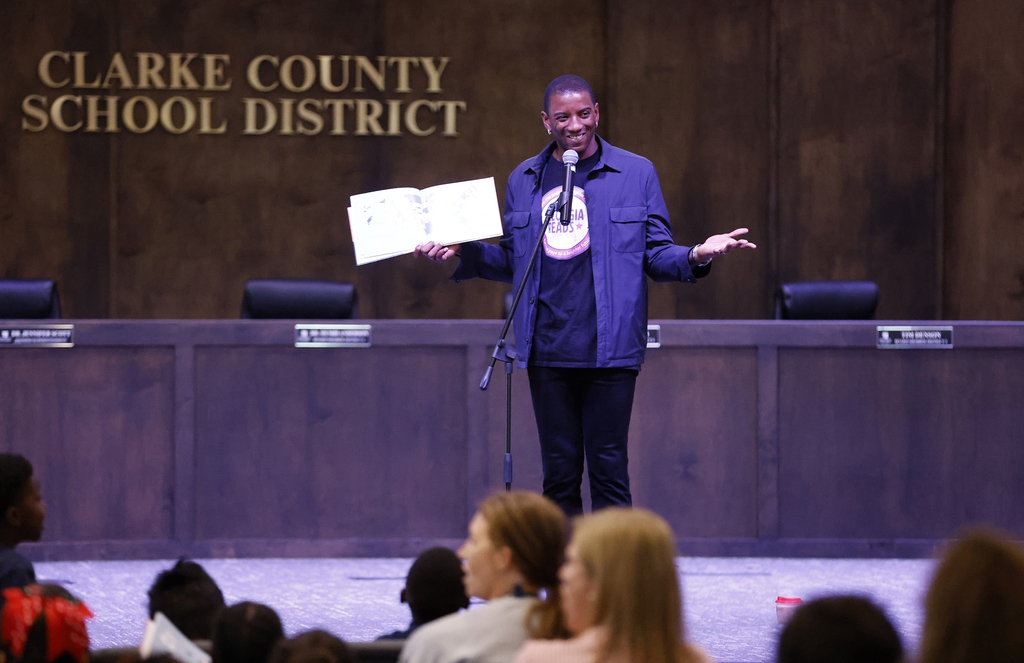 Malcolm Mitchell reading with students
