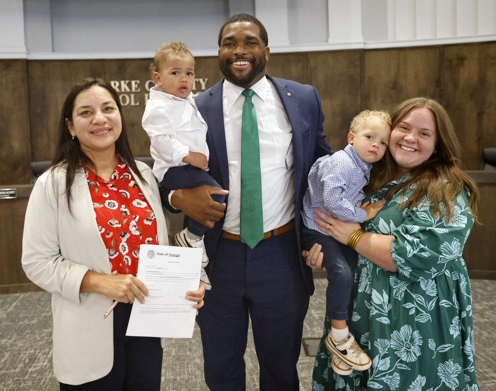 Johnelle Simpson with family and judge