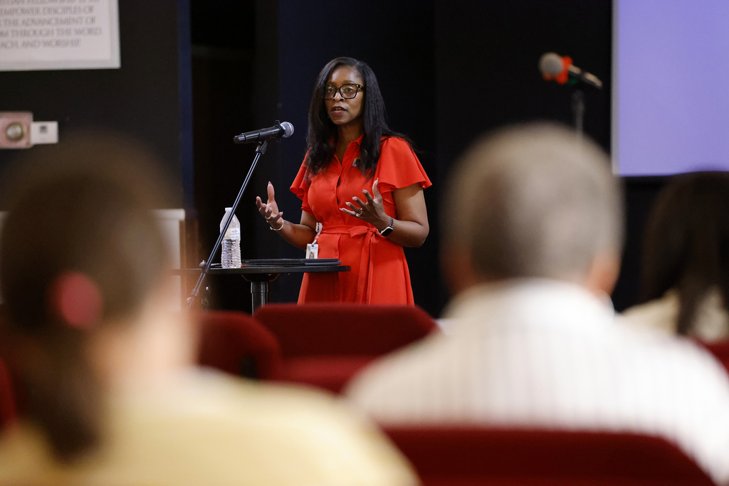Superintendent speaking during community meeting