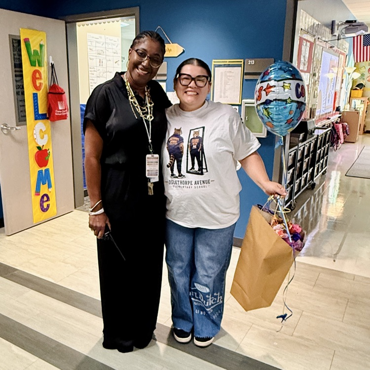 TOTY winner Jailenne Parrott receives flowers and balloons from Ms Boles