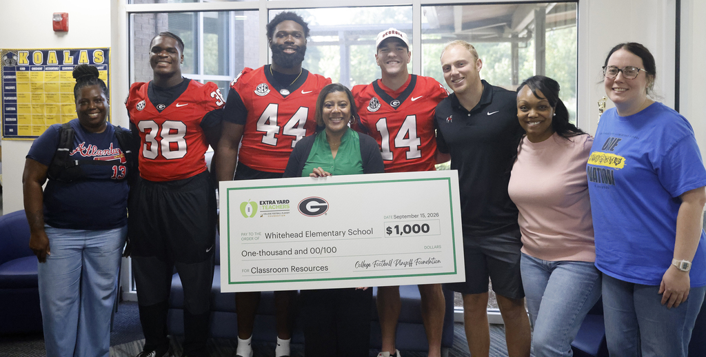 Georgia football players with Whitehead staff