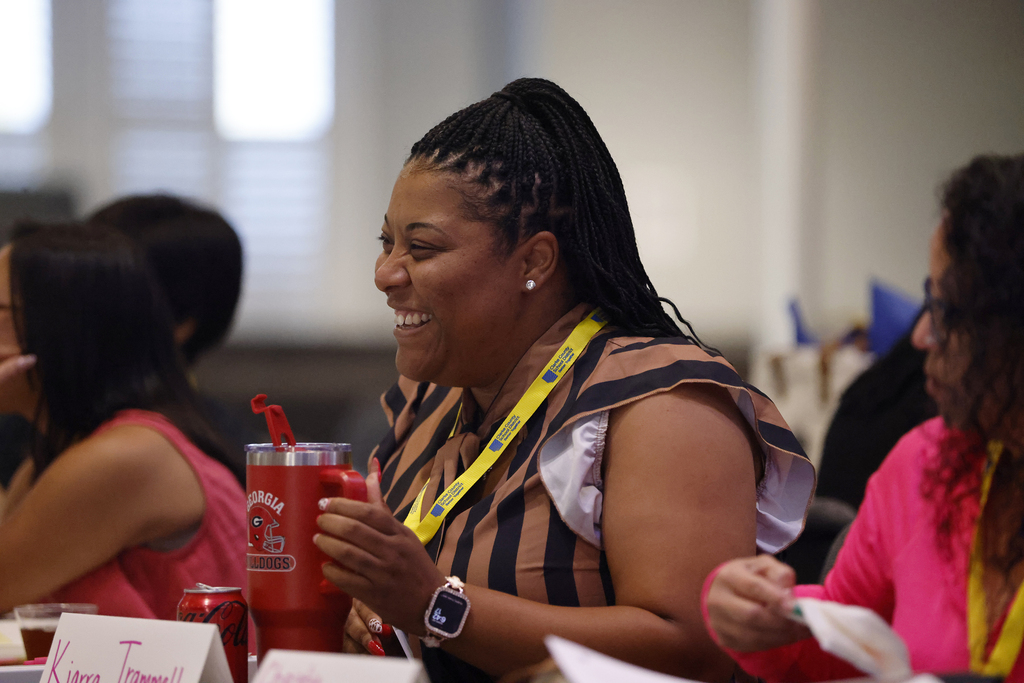VILLA cohort member smiling during conversation