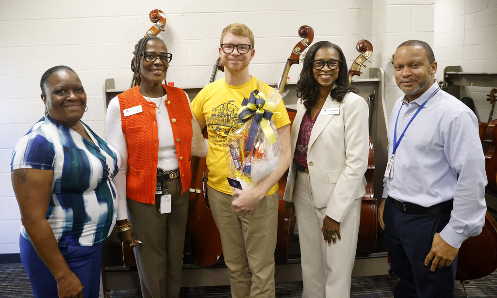 BHL teacher with school administration and Superintendent