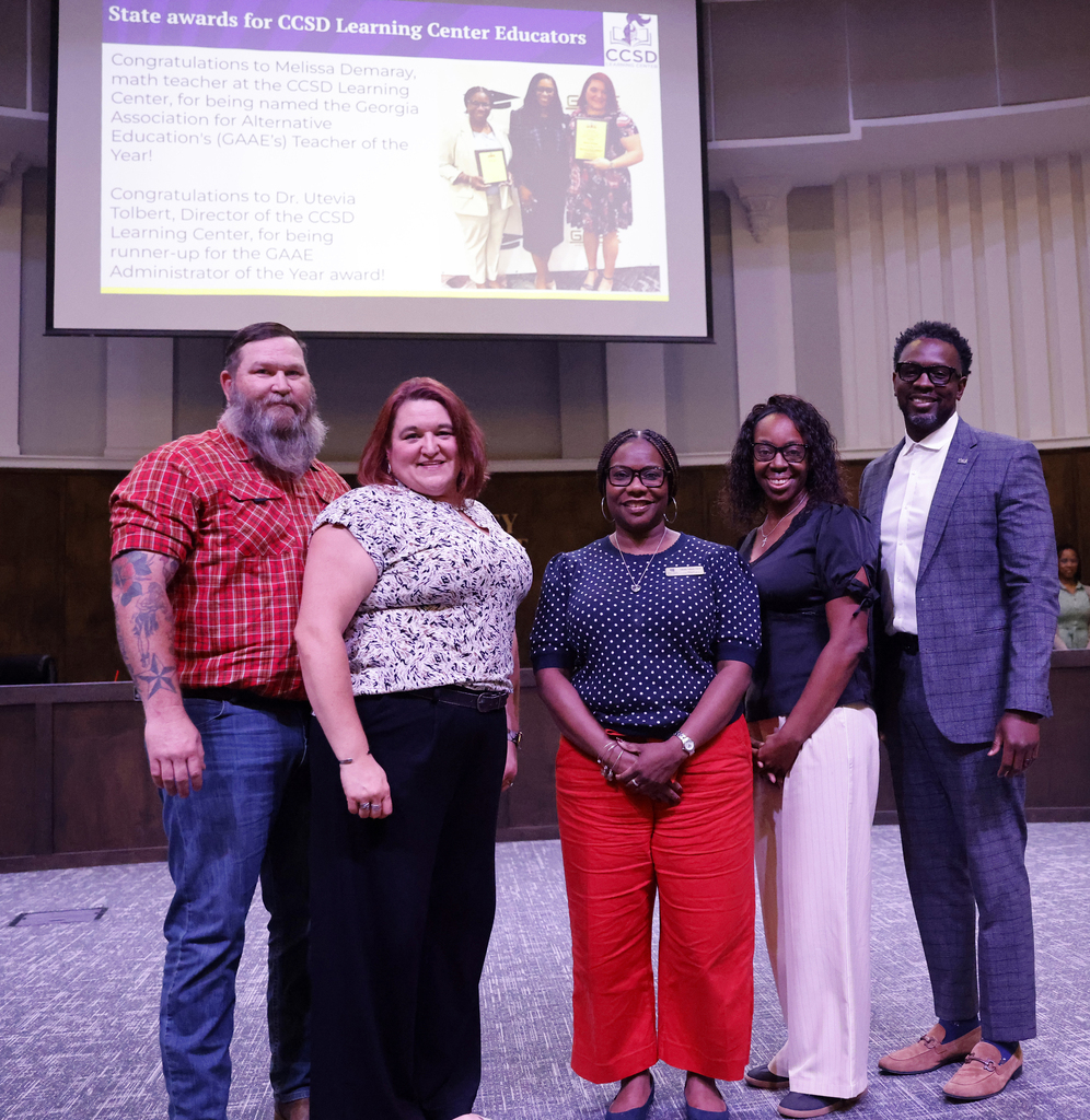 Melissa Demaray and Utevia Tolbert with family and supporters