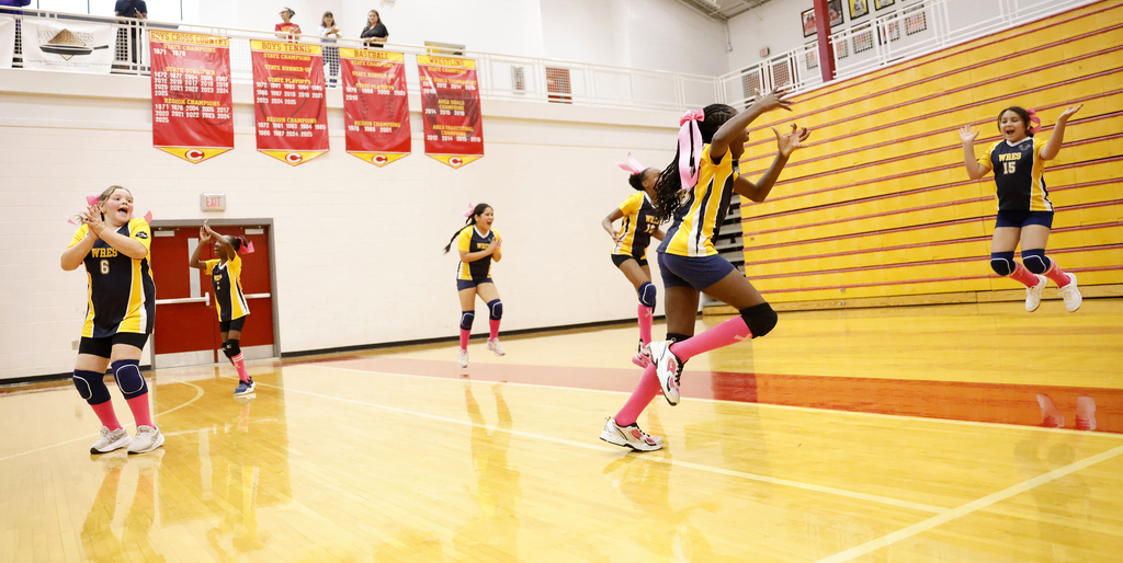 Volleyball team celebrating