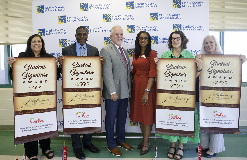 State Superintendent and CCSD Superintendent with principals of J.J. Harris Elementary, Timothy Road Elementary, Barrow Elementary, and Cleveland Road Elementary