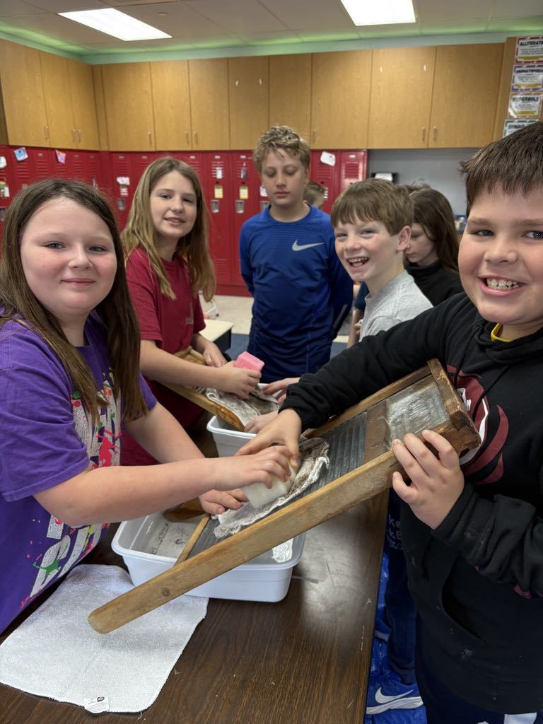 Mrs. French's fourth grade class learned about life in the past. Students used a washboard to do laundry and made butter.