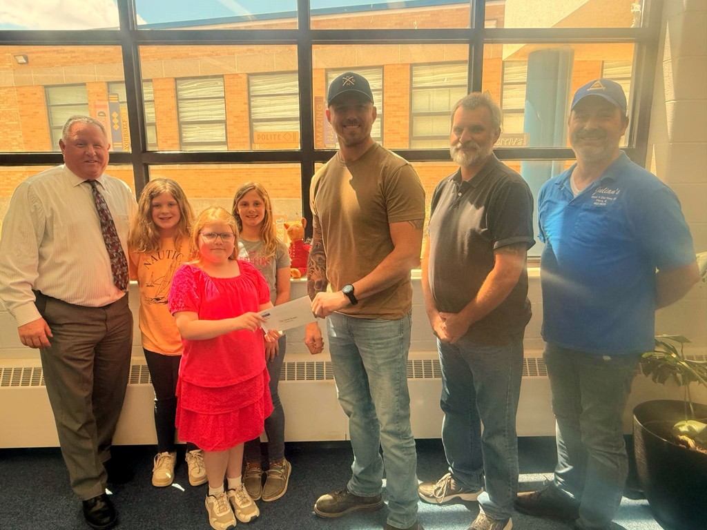 Clay City Schools pre-k through 8th grade students collected change/bills for Flora's Masonic Lodge #204 during the month of April. Funds raised will go to Shriners Hospital in St. Louis. The class that collected the most won a pizza party. The winner was Mrs. French's fourth grade students with a total of $151.12. In total, the school was able to present the Shriners with $553.65! Lodge members Grant Keele, Josh Storment, and Ryan Scott are presented a check by Superintendent Mr. Neubaum and fourth graders Carrie-Ann Gill, Jayde Wolfe, and Emma Storment.