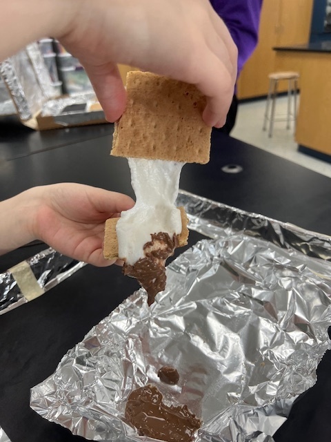 Mr. Brummer’s science class worked on a STEM project to design and build solar ovens this week. They used pizza boxes, foil, plastic wrap, and other materials to create solar ovens that could reach temps of 160 to 200 degrees Fahrenheit! Today they put them to use and made some s’mores using the power of the sun.