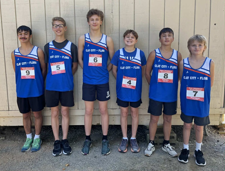 The Clay City/Flora high school co-op cross country team takes 2nd place at the Lawrenceville High School meet. Congratulations runners!